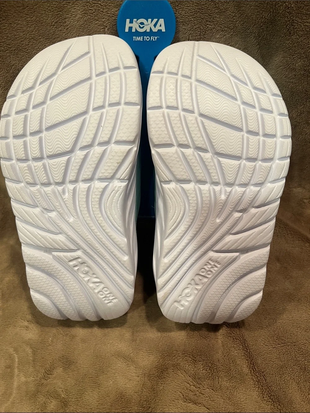 Hoka Slide Sandals in Light Egghell Blue with Pink Accent